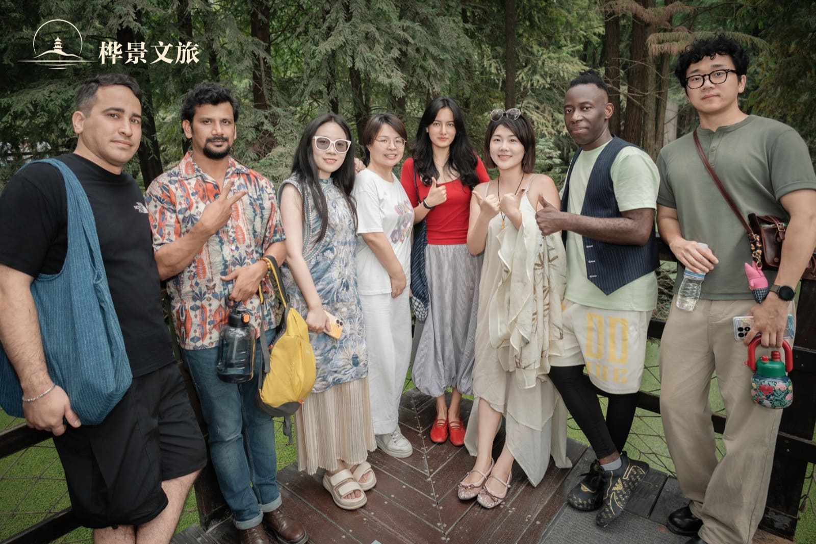 Participants standing together for a photograph at the Qingshan Lake gathering
